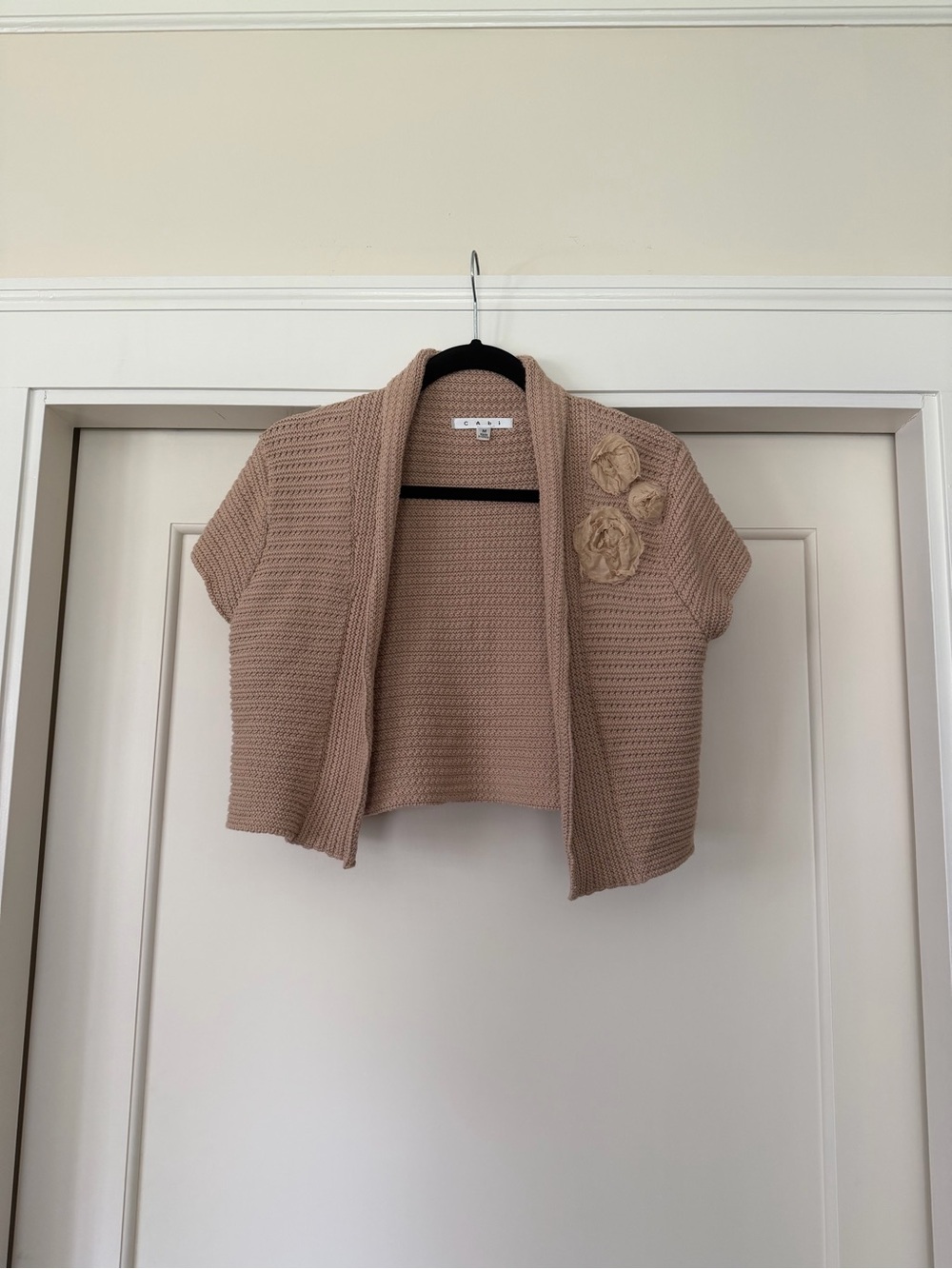 CAbi Tan Shrug with Rosette Detail — Style 294
